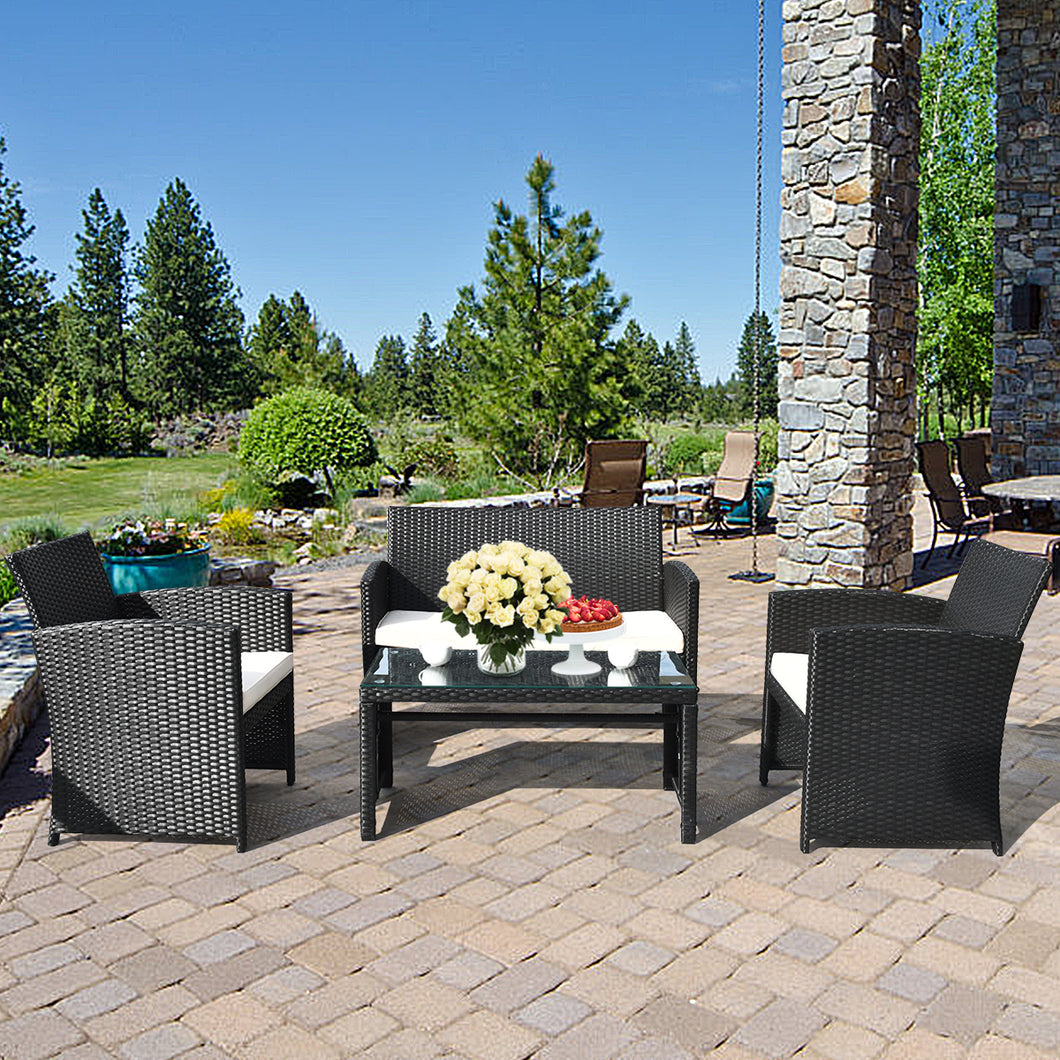 Gymax 4PCS Rattan Patio Conversation Set Outdoor w/ Coffee Table Cushioned Sofa